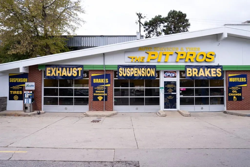 The Pit Pros Auto Services shop on S State St in Ann Arbor with exhaust, suspension and brakes signs